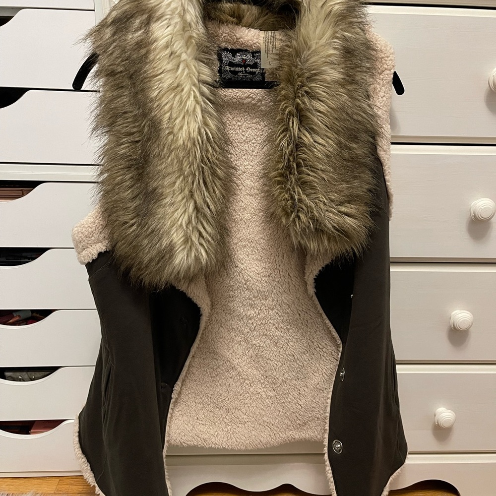 Sherpa lined vest with faux fur neckline